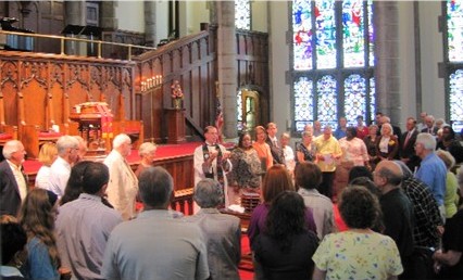 University Church congregation sharing Communion